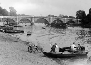 People Prints: People out enjoying the river Thames at Richmond, London, hiring rowing boats