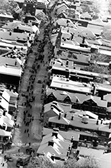 Winter Collection: People make their way to work along a snow covered street in Sittingbourne Kent January