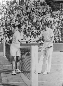 Perry and Austin, leading British players, defeated in Paris tournament. Fred Perry