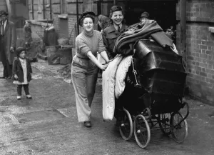 London Life Prints: Photo shows: Miss Evyline Nichol and her ATS friend Audrey Towend wheeling a pram