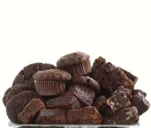 Sweet Prints: Pile of organic chocolate muffins and brownies credit: Marie-Louise Avery / thePictureKitchen