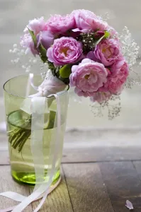 Roses Prints: Pink peonies with gypsophila tied into simple posy style wedding bouquet credit