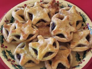 Cooking Prints: Plate of homemade mincepies for sale at village christmas bazaar credit: Marie-Louise