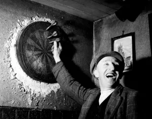 Playing darts in the local pub near Uckfield, Sussex. c. 1938
