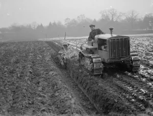 Demonstrations Demos Prints: A ploughing demonstration with the new Melotte tractor fitted with continuous tracks