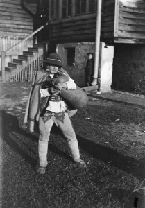 Polands farmyard piper. A Polish piper playing merrily in a farmyard while
