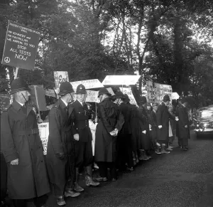 Placards Prints: Police containing protesters outside Birch Grove, Chelwood Gate 8 months after
