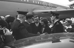 Police at London Aiport escort Davy Jones, singer with the American pop group
