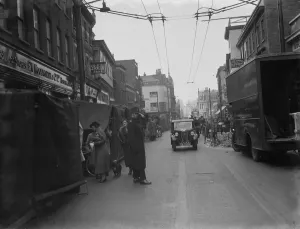A policeman keeps his eye on the traffic on market day in Dartford High Street