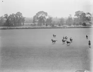 Riders Prints: Polo at Ranlagh A run down the field during the polo match at Ranelagh between the Ouidnuncs