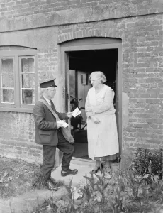 Garden Prints: Postman delivering letters to the front door. 1935