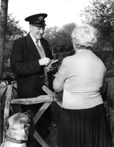 Bicycle Prints: Postman Frederick Smith is photographed making his last delivery on his final day