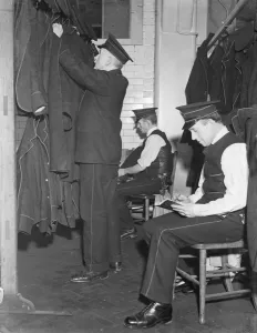 Postmen keep colds at bay. Dry wet clothes and special room at GPO. Specially fitted