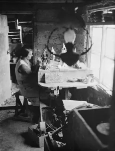 Craft Prints: Pottery maker Mr Sadler painting and finishing some of his ornaments