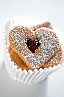 Pretty Prints: Pretty heart shaped biscuits in white paper muffin case9 credit: Marie-Louise Avery