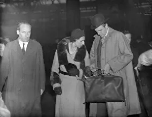 Italian Collection: Prince Alessandro Torlonia and his bride, the Infanta Beatriz of Spain, leave London for America