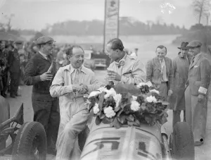 Prince Bira wins international trophy race. Prince Birs of Siam driving an E R