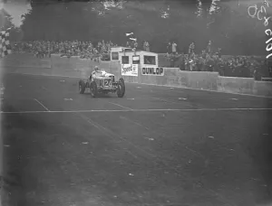 Prince Birabongse swerving in front of Dobson on the finishing line