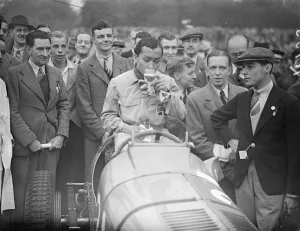 Prince Birabongse toasting his victory after the service in the first international