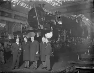 Group Prints: Prince George visits London Midland and Scottish Railway works at Derby. Photo