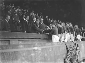 The Prince of Wales attends a football match between unemployed teams at Wembley stadium