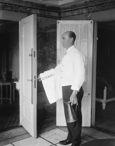 Prince of Wales suite on Bepengaria. J B Langler, bedroom steward. Langler served