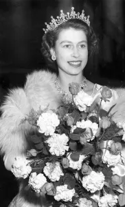 Royal Prints: Princess Elizabeth wearing a tiara and carrying a bouquet of flowers at Warner Theatre