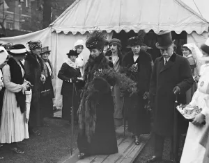 Queen Alexandra at nurses bazaar and fete at Devonshire house 1 May 1919