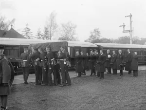Queen Alexandras funeral at Sandringham. The coffin being put on to the train