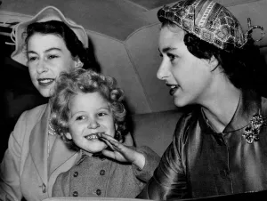 The Queen, Princess Margaret and Princess Anne seen in the Royal car as they left