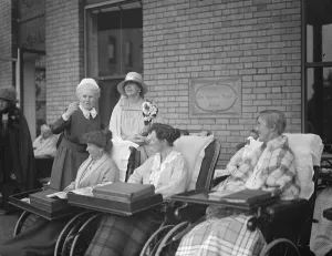 Queen of Romania visits the Royal hospital and home for incurables at Putney