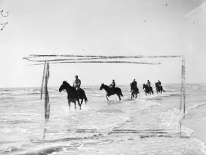 Action Prints: Race horses train on sands. Some of Britains leading racehorses, unable to train