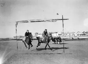Race horses train on sands. Some of Britains leading racehorses, unable to train