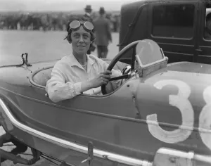 Goggles Prints: Race for women drivers only at Brooklands. Mrs Dykes after winning the race. 1