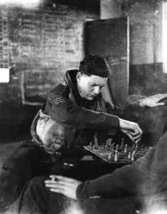 1940s Prints: RAF fighter pilot of 602 Squadron at dispersal - playing chess while waiting for