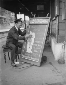 Railway porter sign writer Mr E A Burgar. 1938