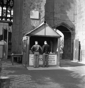 London Prints: The rebuilding of Coventry City, England. A stall inside the bombed Cathedral