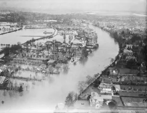 The River Thames, swollen by recent boring and heavy rain, has flooded a wide area