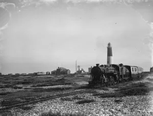 Beach Prints: The Romney, Hythe & Dymchurch light railway terminates at Dungeness beach. This