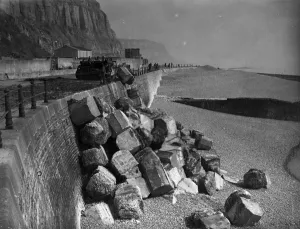 Royal Engineers are removing the concrete dragons teeth defence blocks on the front at Hastings