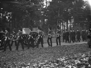 Royal funeral scene at Sandringham. The coffinand the Royal mourners on the way