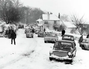 The Royal Oak Public House at the bottom of Crockham Hill in Kent with cars unable