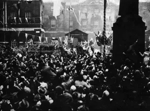 The Royal wedding. Crowds greet the King and Queen in their glass coach with a Sovereign s