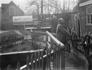 S O Garnham at the water powered, flour East Hill Mill in Ashford, Kent, which