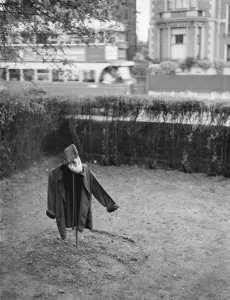 A scarecrow in a garden. 1938