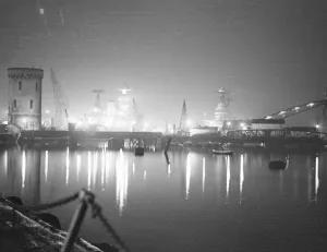 Searchlight display in honour of Royal wedding at Portsmouth. Searchlights playing over Repulse