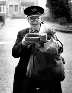 Spectacles Prints: For seventeen years Mr Harold Smith has been a postman and he lives and works in Sidcup
