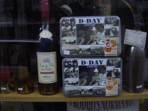 Alcohol Prints: Shop window displaying bottles of Calvados, Cognac, Armagnac and cider brandy