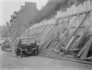 Shoring up a landslide with wooden braces in Dartford, Kent. 1938