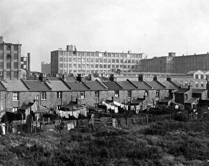 Exterior Collection: Siemens Factory and adjacent housing, Woolwich, London 17 October 1951